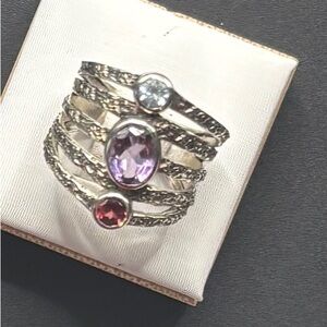 A Size 7 Sterling Silver ring with Amethyst,Amber,and Blue Topaz stones